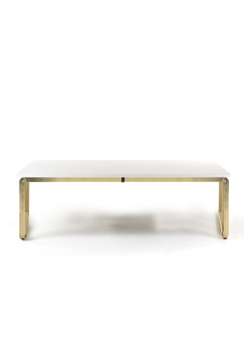 design table with brass structure and wooden top
