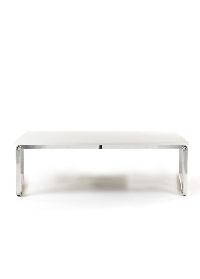 low table made in chrome steel and wooden desk