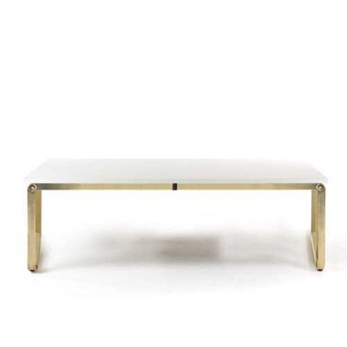 design table with brass structure and wooden top
