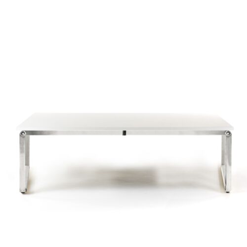 low table made in chrome steel and wooden desk